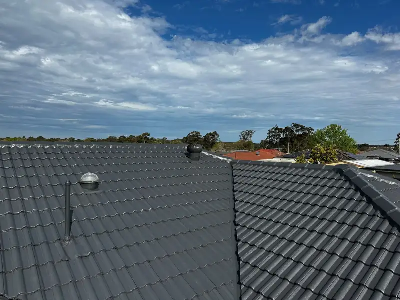 Whirlybird roof ventilator on a restored charcoal tile roof